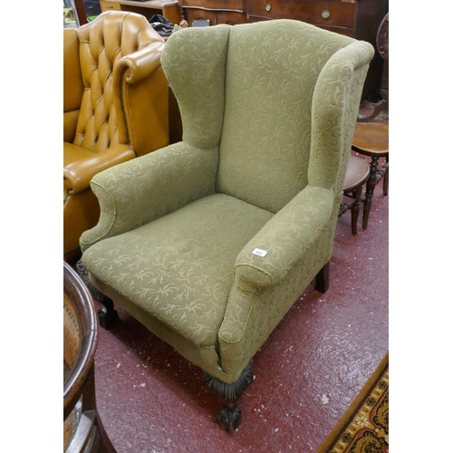 523 - Green wingback chair