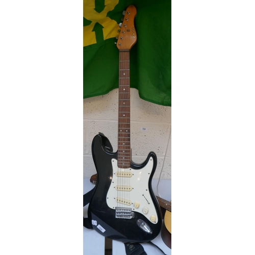 558 - Electric guitar by Encore 