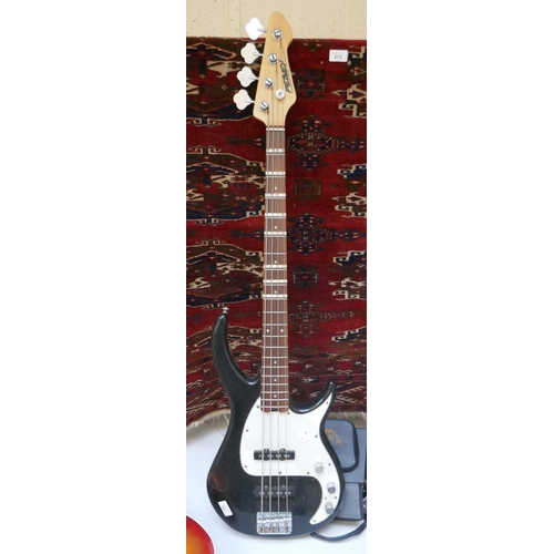 561 - Electric bass guitar by Peavey