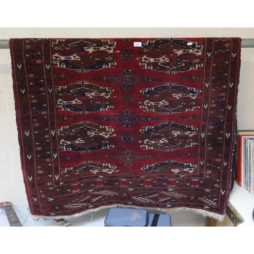 572 - Red patterned rug