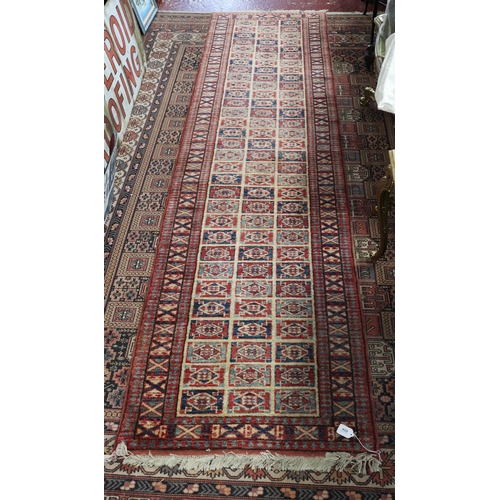 624 - Red patterned runner - Approx size: 74cm x 296cm