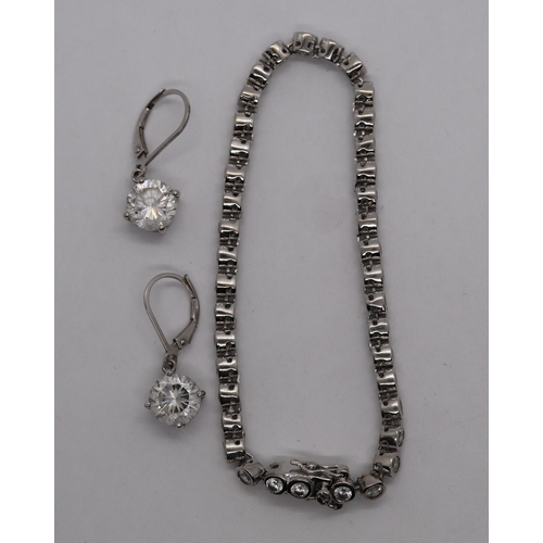 67 - Silver bracelet and earrings