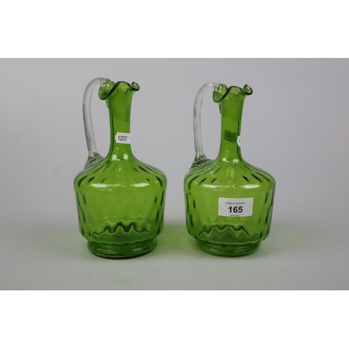 165 - Pair of green glass decanters