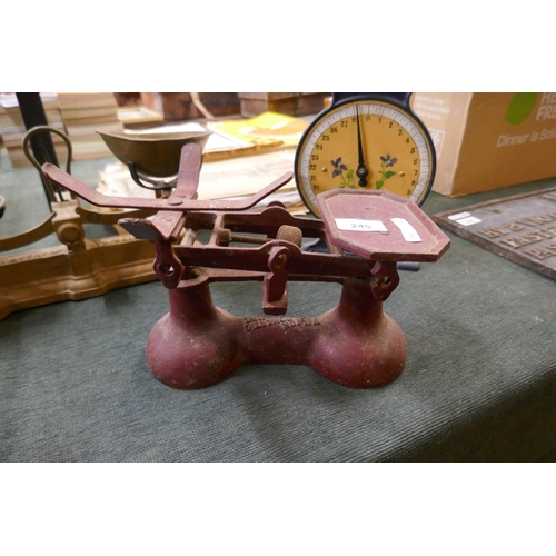 245 - Collection of vintage weighing scales