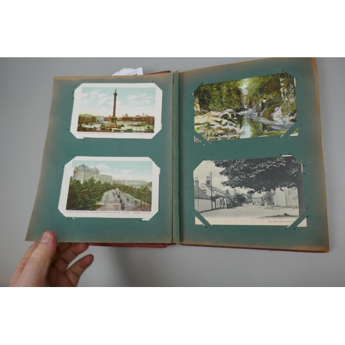 260 - 2 albums of postcards