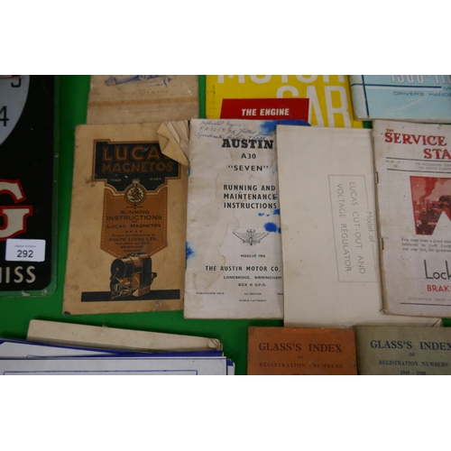 292 - Automobilia - Car manuals and a Smiths advertising clock