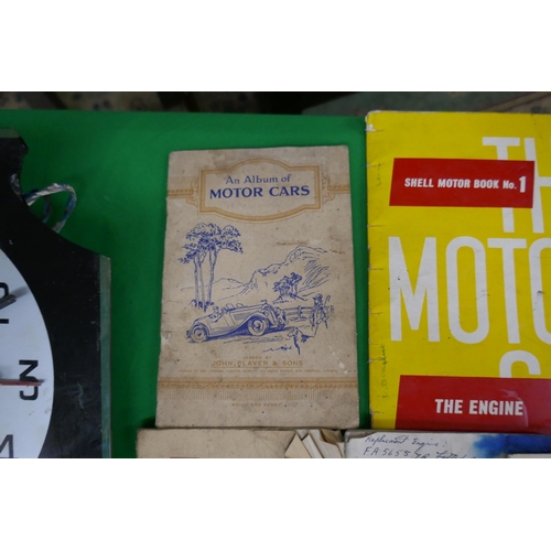 292 - Automobilia - Car manuals and a Smiths advertising clock