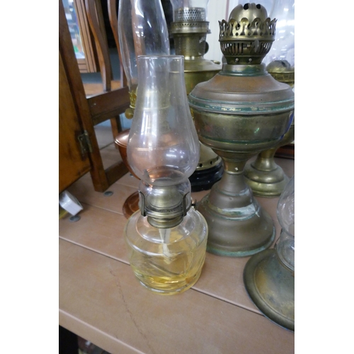 375 - Collection of oil lamps