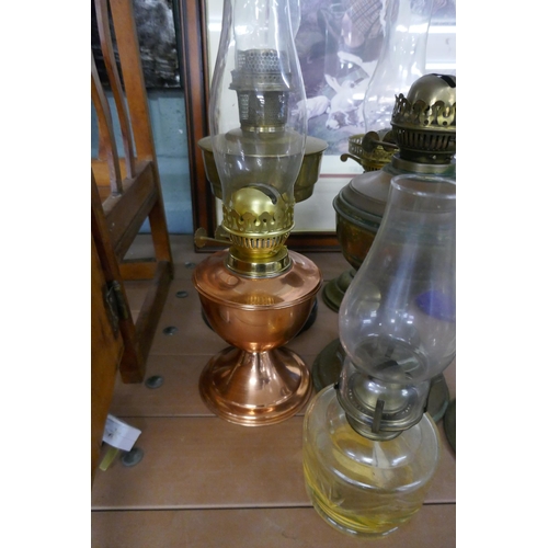 375 - Collection of oil lamps