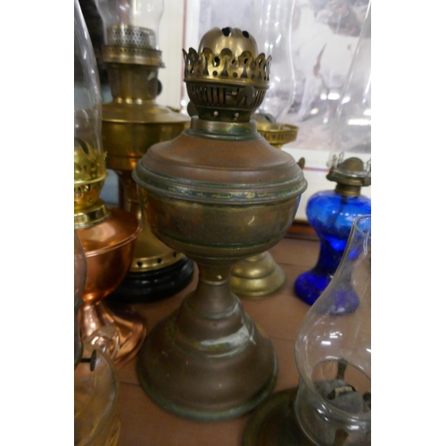 375 - Collection of oil lamps