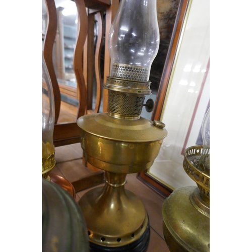 375 - Collection of oil lamps