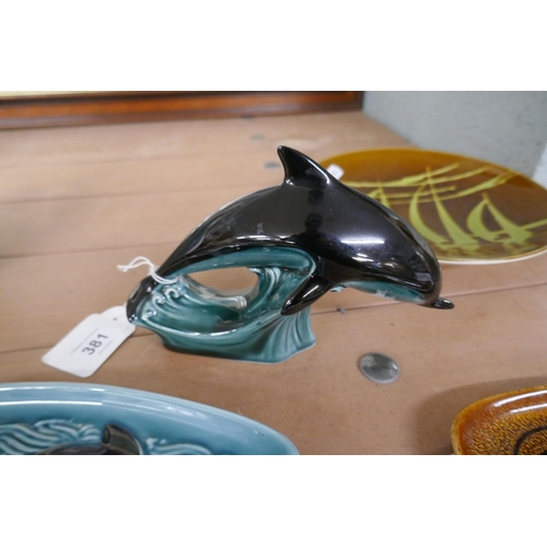 381 - Collection of Poole dishes to include dolphin figure