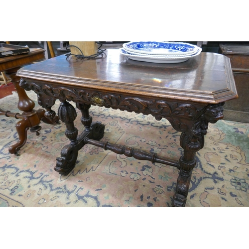 388 - Fine Victorian carved oak centre table on dolphin feet - Approx size: W: 98cm D: 64cm H: 75cm