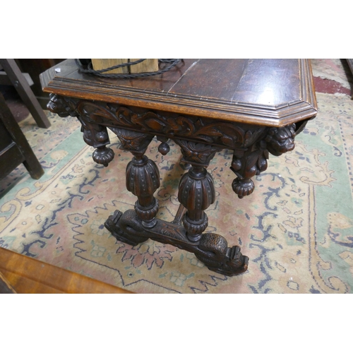 388 - Fine Victorian carved oak centre table on dolphin feet - Approx size: W: 98cm D: 64cm H: 75cm