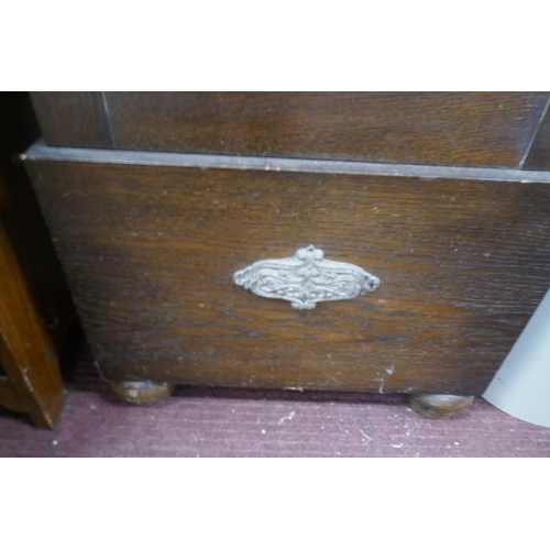 439 - Art Deco oak long case clock with brass weights and pendulum in GWO