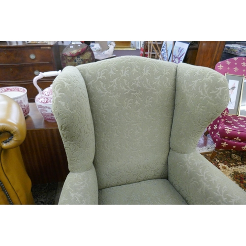 523 - Green wingback chair