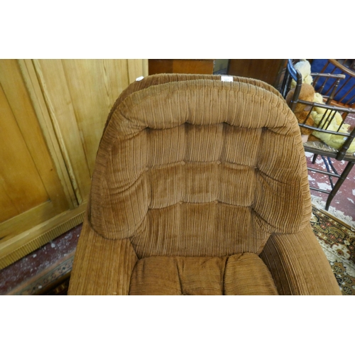 527 - Comfortable retro swivel chair with brown corduroy upholstery