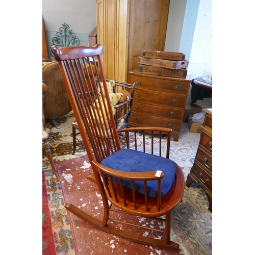 543 - Pair of mid century stick back rocking chairs