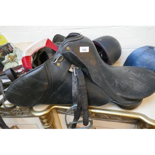 576 - Saddle together with riding tack