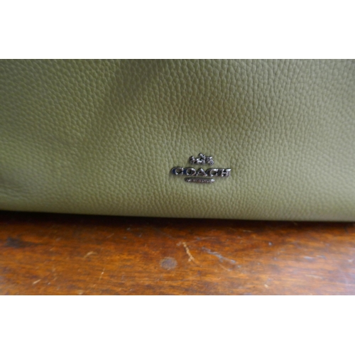 613 - Green leather handbag by Coach with original receipts together with a Ralph Lauren handbag with orig... 