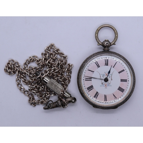 102 - Hallmarked silver ladies pocket watch together with hallmarked silver chain, dogtag and winder