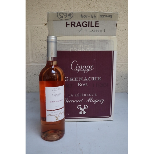 128 - 6 bottles of Grenache rose. Sold as seen, from a deceased estate, we do not know how they have be st... 