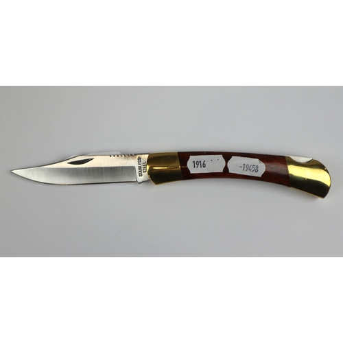 150 - Mahogany and brass locking knife