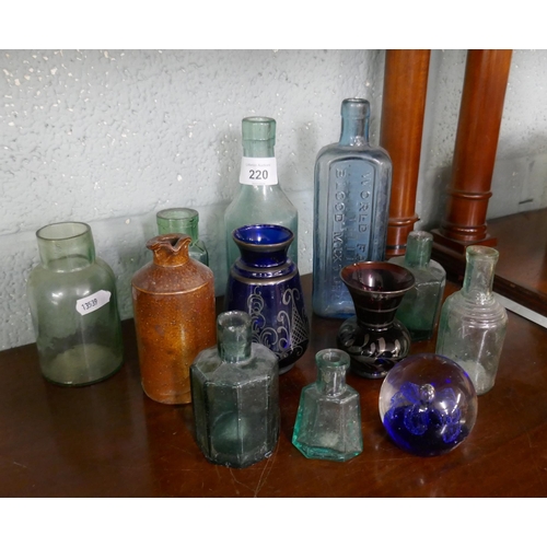 220 - Collection of early glass bottles 