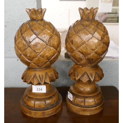 334 - Pair of carved wood pineapple finials - Approx height: 28cm