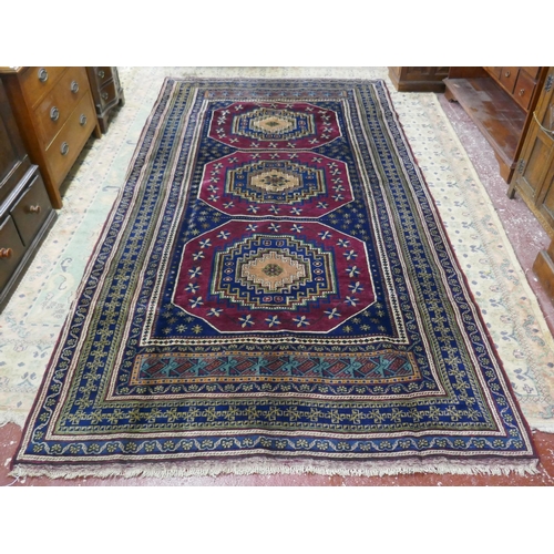 429 - Red & blue patterned rug - Approx size: 350cm x 180cm
