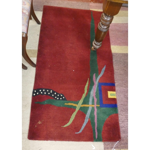 514 - Red abstract rug - Approx size: 140cm x 72cm