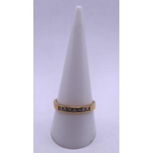 55 - 18ct gold 7 stone princess cut diamond ring - Size: S