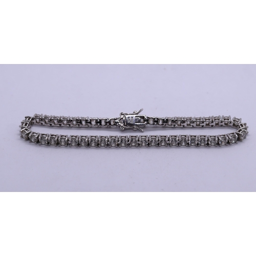 67 - Silver CZ tennis bracelet