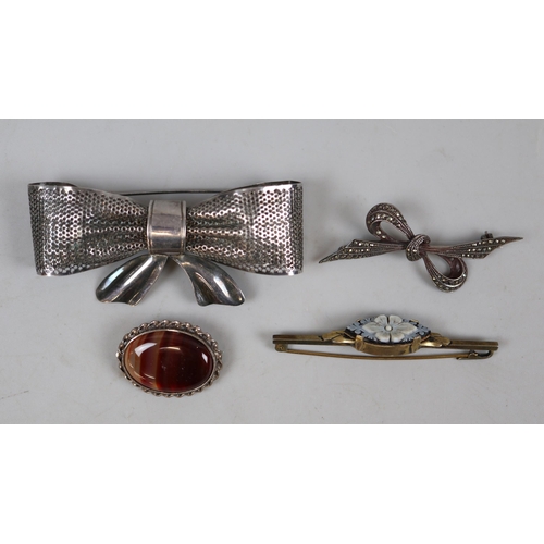 68 - 4 silver brooches