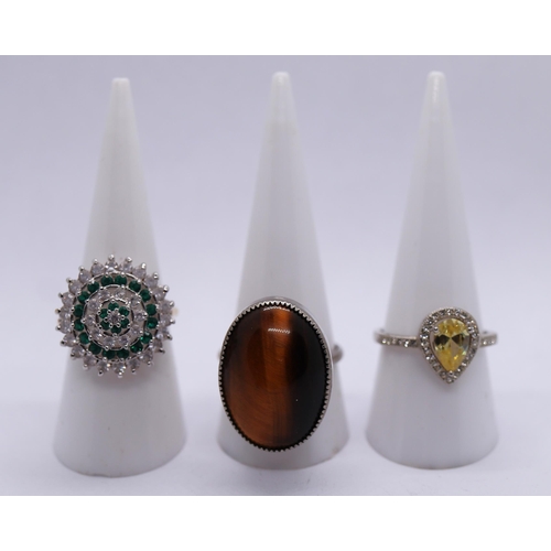 75 - Silver tiger eye set ring together with 2 costume rings