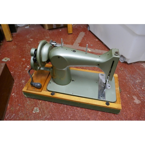 379 - 2 Singer sewing machines