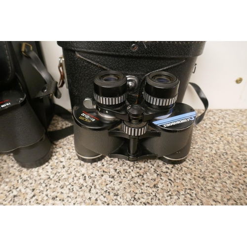 381 - Canon camera EOS650, Canon zoom lens EF20210, skylight filter, Camera bag & 2 pairs of binocular... 