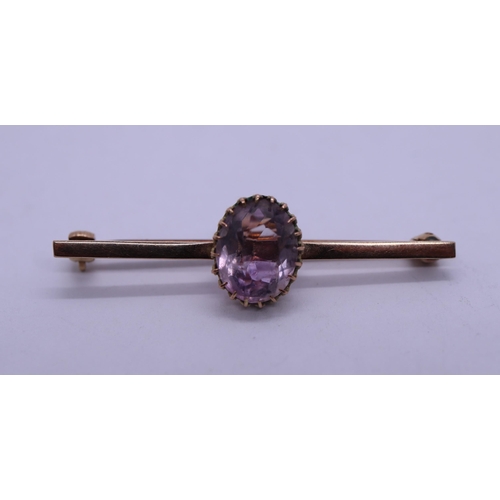 58 - 2 x 9ct gold amethyst brooches