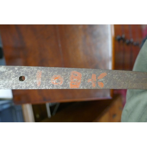 144 - Samurai sword with signature to tang. Believed to be a WW2 NCO Japanese officers sword commonly know... 