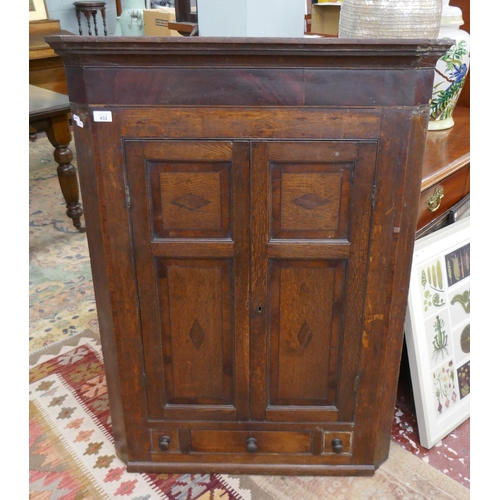 432 - Antique inlaid oak corner cupboard