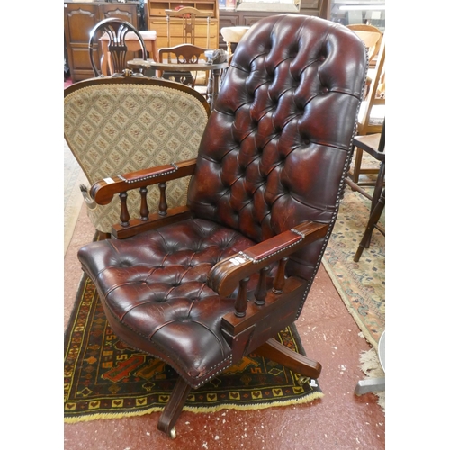 449 - Leather studded desk armchair on castors