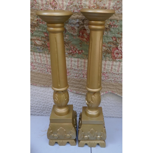 478 - Pair of large gilt candlesticks