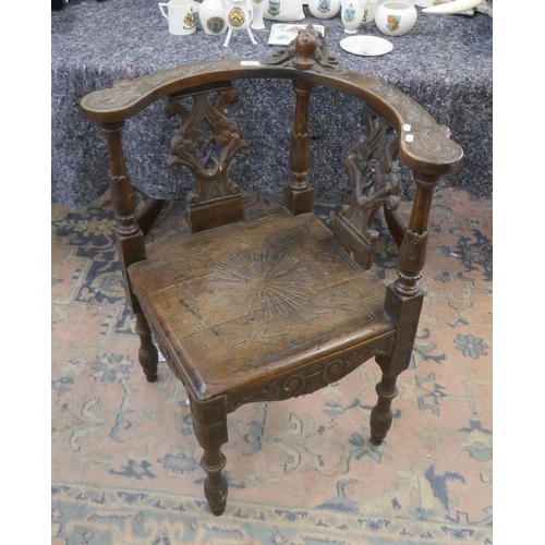 521 - Carved oak chair