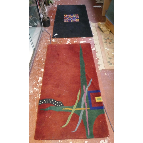 527 - 2 abstract rugs - Approx size 137xm x 72cm