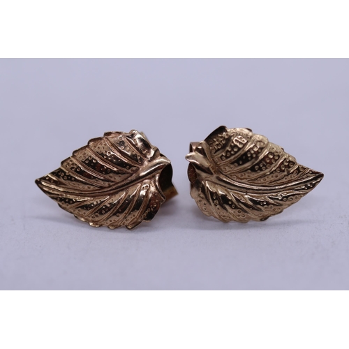 63 - Pair of 9ct gold leaf earrings 
