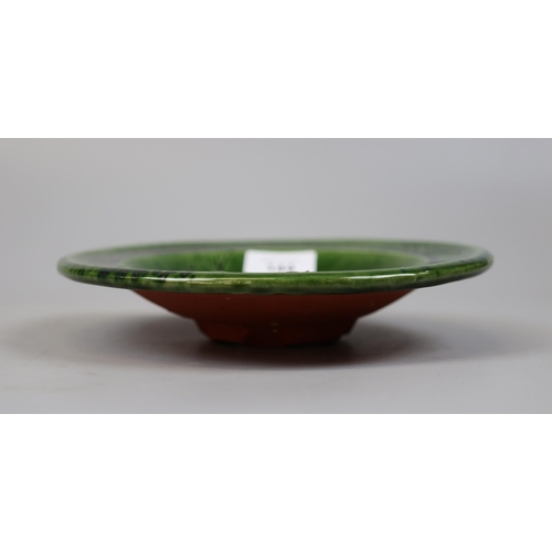 144 - John Hudson B. 1946 green slipware bowl with bird decoration