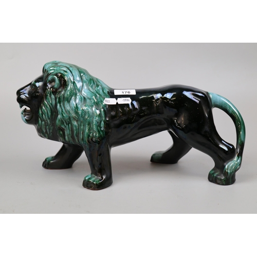 176 - Large glazed ceramic lion and duck figure - Approx height 22cm Length of lion approx 43cm