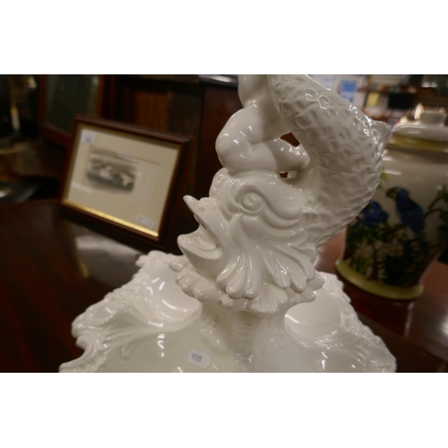 427 - White ceramic centrepiece depicting cherub and dolphin - Approx height 57cm