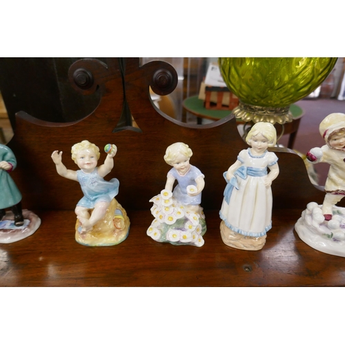 439 - Collection of Royal Worcester figurines mostly modelled by Doughty