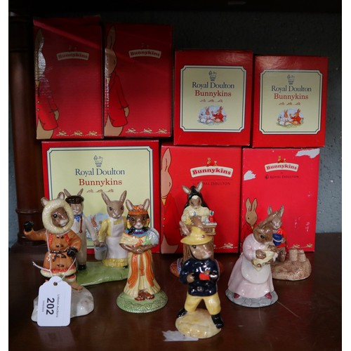 202 - 7 Bunnykins figurines in original boxes by Royal Doulton